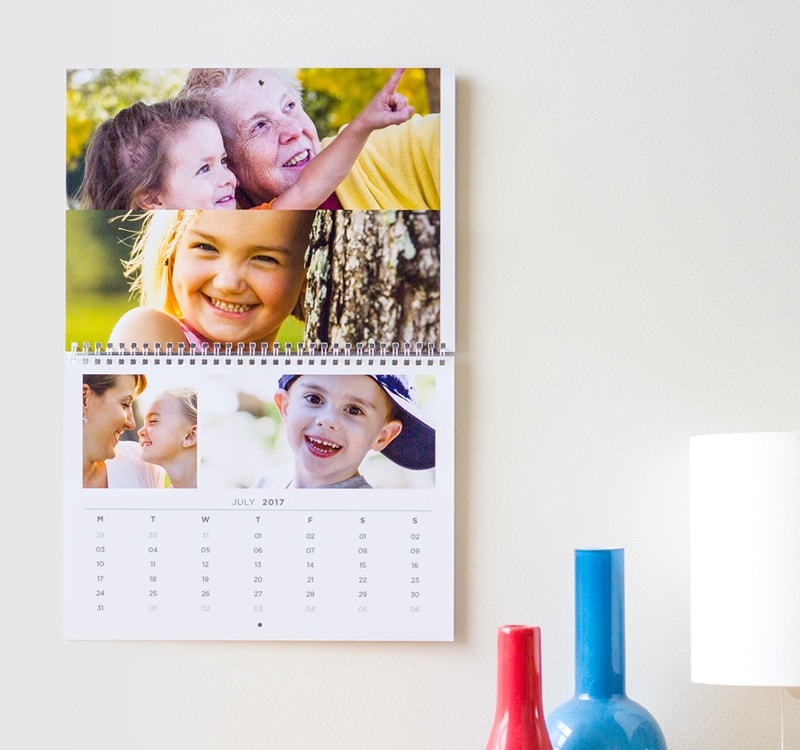 Wall Calendar featuring easy hanging hole and white wire binding